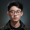 核实编辑张浩然头像，年轻专业形象，眼镜书卷气